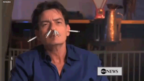 Charlie-Sheen-Smoking-Crazy-During-An-Interview.gif
